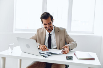 Paper company holding document happy planning office laptop businessman suit