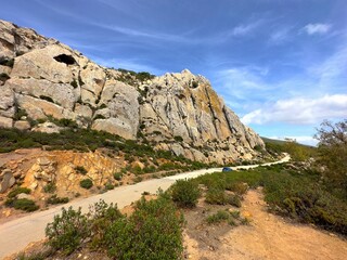landscape in the mountains, rocks and Moorish Cave near Bolonia, Cueva del Moro, Andalusia, Spain 