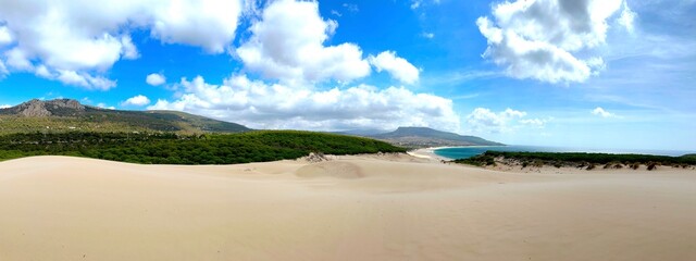 panorama view from the top of the high sand dunes in Bolonia with a view towards the Atlantic Ocean, Bolonia, Costa de la Luz, Andalusia, Cadiz, Spain