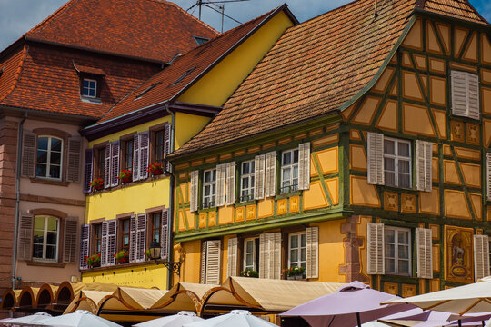 Beautiful colorful half timbered house of the village of  Riquewihr in Alsace France