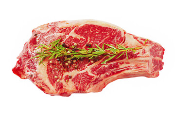 Beef steak with various peppercorns. Raw beef meat isolated on white.