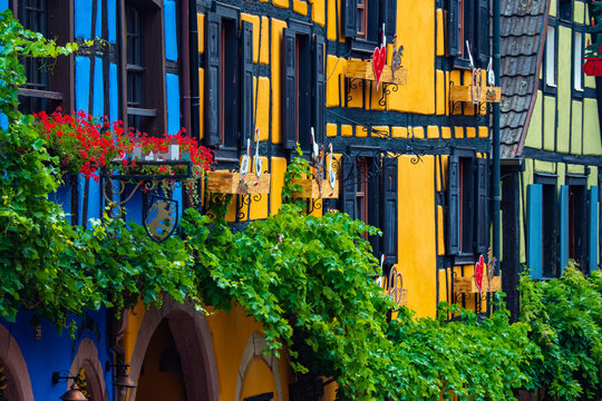 Beautiful colorful half timbered house of the village of  Riquewihr in Alsace France