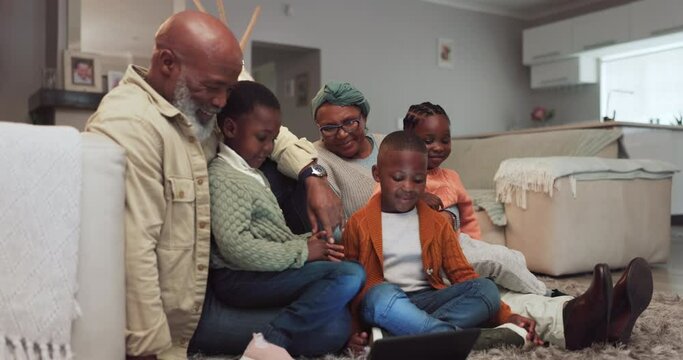 Family, tablet and grandparents with children at home watching movie or video for e learning. African woman, man and kids together in lounge with technology for education, streaming and internet game
