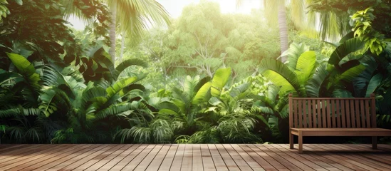 Fotobehang 3D rendered wooden terrace in a tropical garden featuring a wooden floor green plant fence wood and white fabric chair and surrounded by nature Copy space image Place for adding text or design © Ilgun