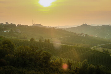 landscapes of the Piedmontese Langhe at sunset with the colors of autumn near Alba in the period of...