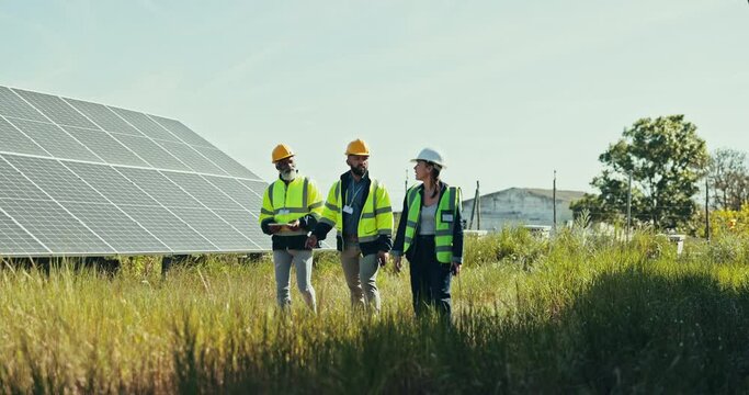 Group, engineer and people with solar panel, outdoor and nature with teamwork, walking and cooperation. Staff, manager and employees with sustainable installation, renewable energy and contractor