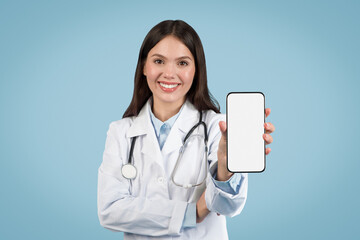 Woman doctor with phone, blank screen shown