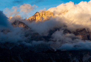 Mountain Sunset Through The Clouds