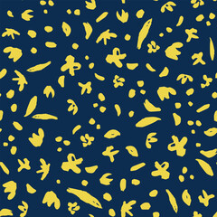 Abstract yellow botanical seamless repeat pattern. Random placed, vector flowers and leaves seamless repeat pattern on dark blue background.