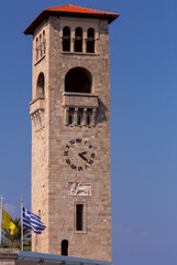 Tall Venetian tower in front of the old Orthodox Greek church in Rhodes.