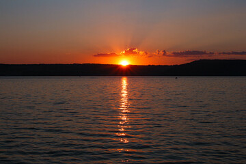 Naklejka premium Sunset. The unknown. Nostalgia. Reflection. Stopping.The sunset sky.