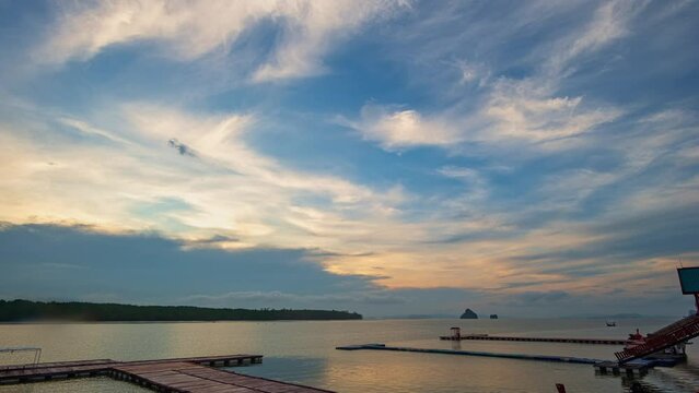 ..Time lapse view of the Panyee Islands, with many islands and intact mangrove forests..scenery cloud in sunrise at pier in Panyee island. .scenery cloud above the sea at twilight.