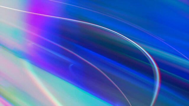 Abstract bright dinamic background with rainbow lines. Wavy lines of variegated flowers. Moving rainbow multi-colored stripes.