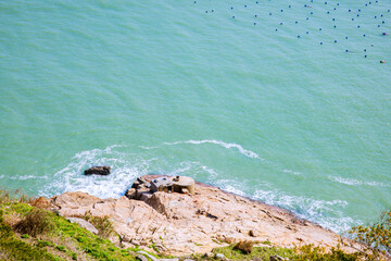 Lianjiang County, Fuzhou City, Fujian Province-sea rock landscape against the blue sky