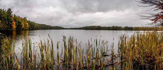 Cloudy fall evening on a pond