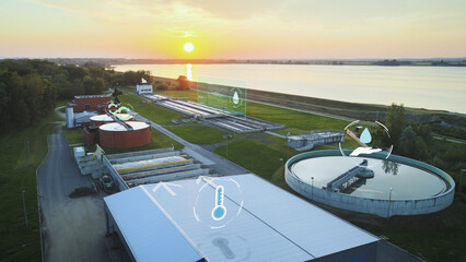 Aerial Of A Water Cleaner Treatment Facility During Sunset With Graphical Visual Effects