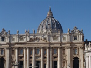 Fototapeta na wymiar Exterior view of the Papal Basilica of Saint Peter in the Vatican on a sunny day