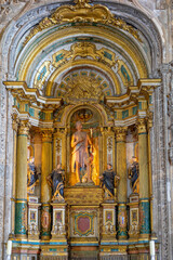 Fototapeta na wymiar altar with representation of a saint on the side of the Jerónimos church in Lisbon.