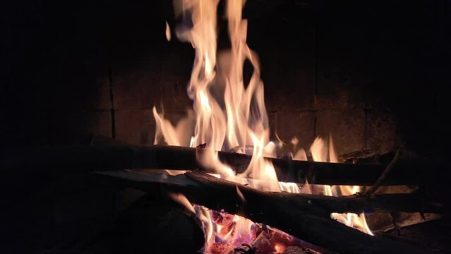 Experience the enchanting allure of a nighttime chiminea, where flames flicker in a dance of winter, Christmas, and spirituality. Slow-motion 4K footage at 120 frames per second captures the cozy magi