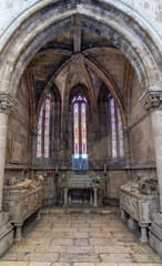 Obraz premium Chapel of São Cosimo and São Damião with the statue in the center in the Lisbon Cathedral.