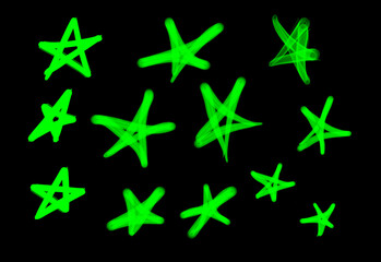 Fototapeta na wymiar Collection of graffiti street art tags with star symbols in light green color on black background