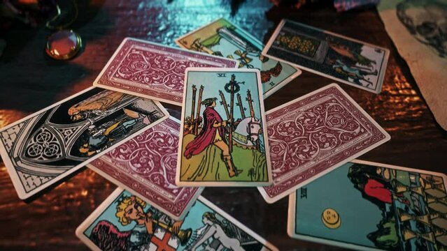 Madrid, Spain - September 13, 2022. Spiritual psychic reading of the Six of Wands tarot card for fortune telling. Divination spiritual tarot reading ritual. Spiritual reading of the Tarot cards deck.