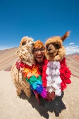 Papier Peint photo Vinicunca peruvian alpacas and tourist in cusco vinicunca rainbow montain