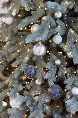 Fototapeta premium Christmas tree with decorations and lights