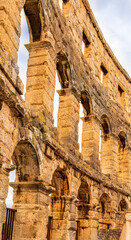arc wall of ancient building in arena colosseum style, typical roman architecture with arches,...