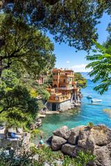 Portofino, Italy - August 3, 2023: Luxury houses along the Italian coast in Portofino, Italy