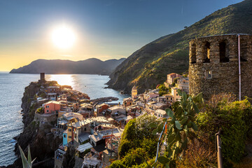 Vernazza, Italy - August 2, 2023: The city seen from the hiking trail. Vernazza is a town in the province of La Spezia, Liguria. It is one of the five cities in the Cinque Terre region - obrazy, fototapety, plakaty