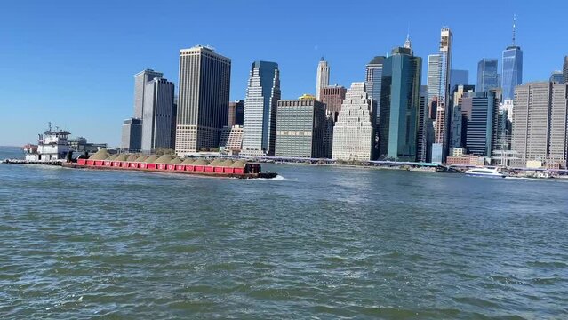 Sand Barge floating in river Hudson