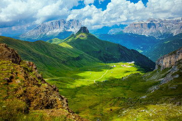 landscape with mountains, hills, clouds and rocks