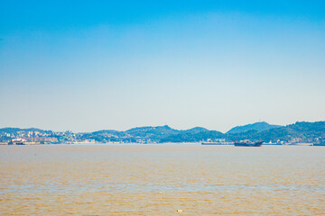 Dongtou Islands, Dongtou District, Wenzhou City, Zhejiang Province - seascape of islands and fishing boats against the blue sky