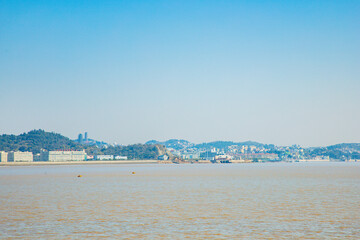 Dongtou Islands, Dongtou District, Wenzhou City, Zhejiang Province - seascape of islands and fishing boats against the blue sky