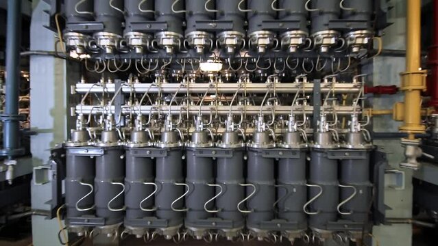 Close Up Of Modernized Gas Centrifuges For Uranium Isotope Separation Zooming Out To General View. Lots Of Units In Straight Rows. Enrichment Of Uranium At Electrochemical Integrated Plant.