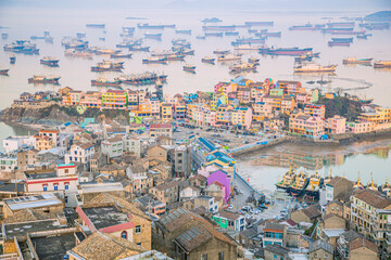 Xiaoruo Village, Wenling City, Taizhou City, Zhejiang Province - high angle view of fishing village and fishing port at sunrise