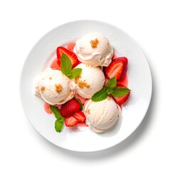 Top view of plate of ice cream scoops with strawberries on white background.