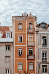 Traditional apartment building in Lisbon Portugal - exterior. Portuguese style vintage house with multiple condos.
