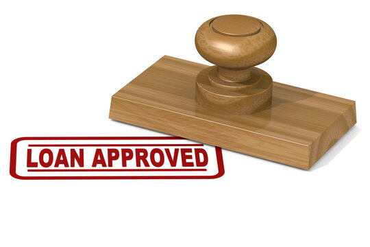 Wooden stamp with loan approved word