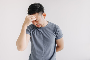 Unpleasant feeling emotion of asian man isolated on white. Depressed and Stress