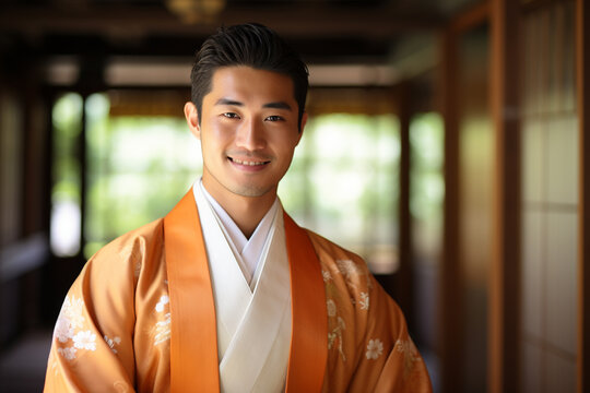 japanese man wearing a hakama and smiling bokeh style background