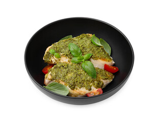 Delicious chicken breasts with pesto sauce, tomatoes and basil isolated on white