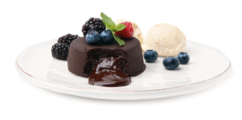 Plate with delicious chocolate fondant, berries, mint and ice cream isolated on white