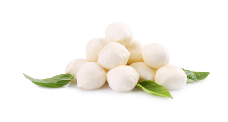 Tasty mozzarella balls and basil leaves isolated on white