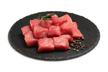 Pieces of raw beef, rosemary and peppercorns isolated on white