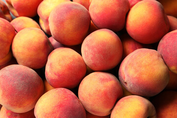 Fototapeta na wymiar Many fresh peaches as background, top view