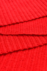 overlap of red wool knitted yarn texture, woolen fabric background