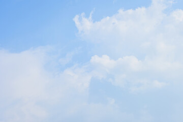 beautiful blue sky and white fluffy cloud with sunrise in the morning, natural background