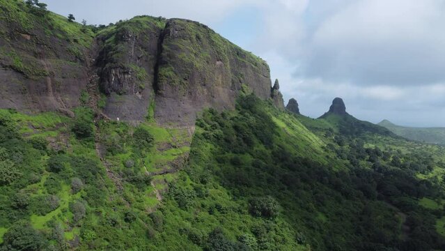 Aerial view of popular and historical tourist attraction Anjaneri Fort during monsoon in Trimbakeshwar, Nashik, Maharashtra, India